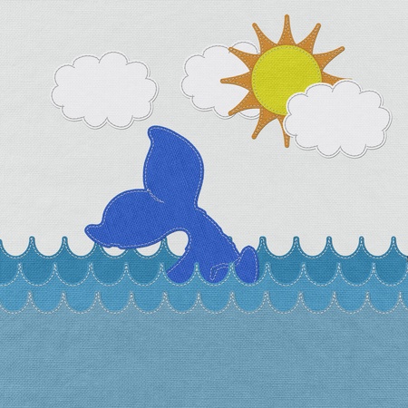 Cute Smiling Whale with stitch style on fabric backgroundの写真素材