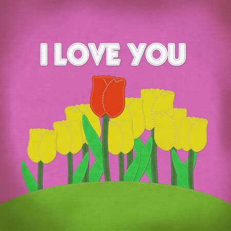 Tulip on green grass field with stitch style fabric backgroundの写真素材