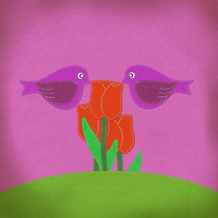 Tulip on green grass field with stitch style fabric backgroundの写真素材
