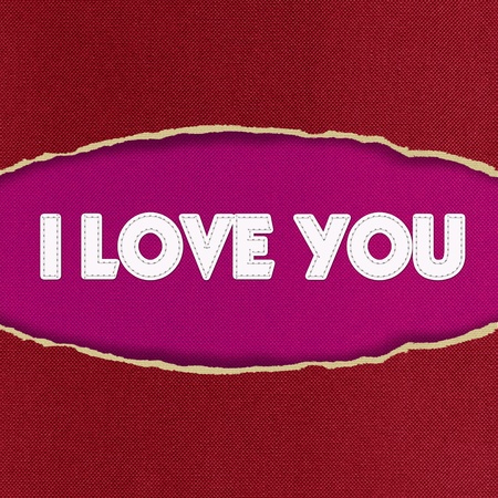 I love you inside Oval Hole ripped in fabric backgroundの写真素材