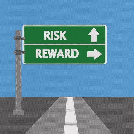 Risk and reward highway sign concept with stitch style on fabric backgroundの写真素材