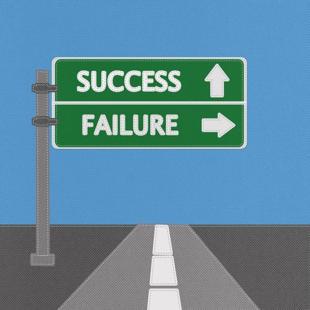 Success and failure highway sign concept with stitch style on fabric backgroundの写真素材