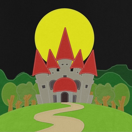 Fairy-tale castle on a green field with stitch style on fabric backgroundの写真素材