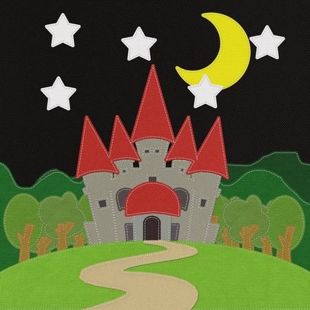 Fairy-tale castle on a green field with stitch style on fabric backgroundの写真素材
