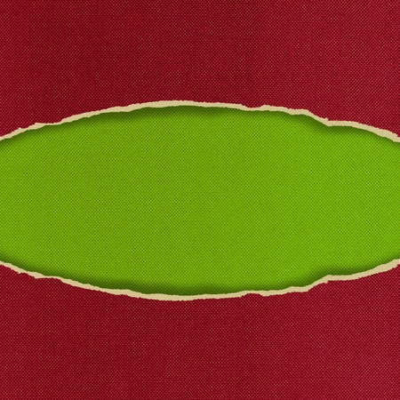 Oval Hole ripped in fabric backgroundの写真素材