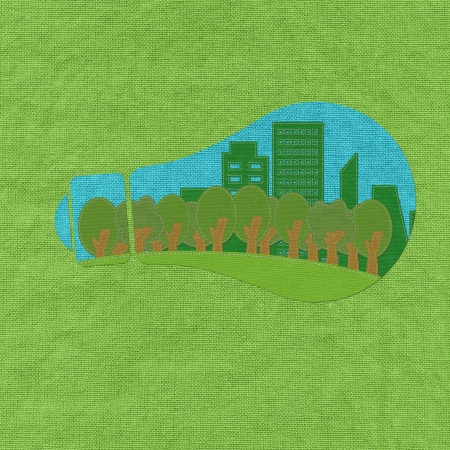 ECO concept inside bulb with stitch style on fabric backgroundの写真素材