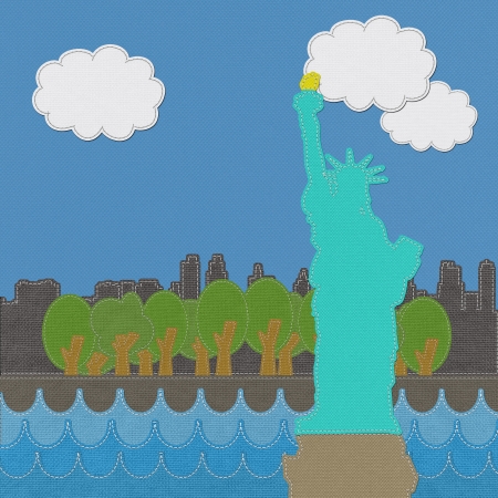 Statue of Liberty in stitch on fabric backgroundの写真素材