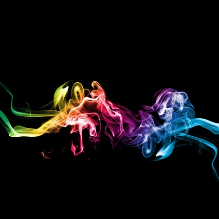 Rainbow smoke on black backgroundの写真素材
