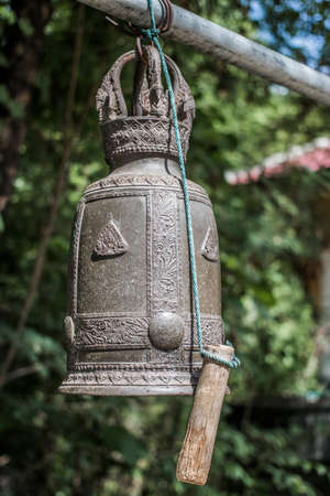 a number of old bells in the Thailand の写真素材