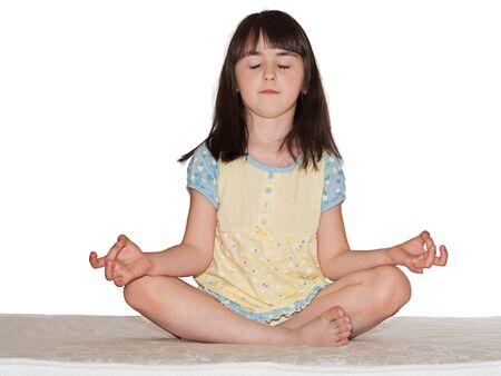 Peaceful meditate caucasian girl on the mattressの写真素材