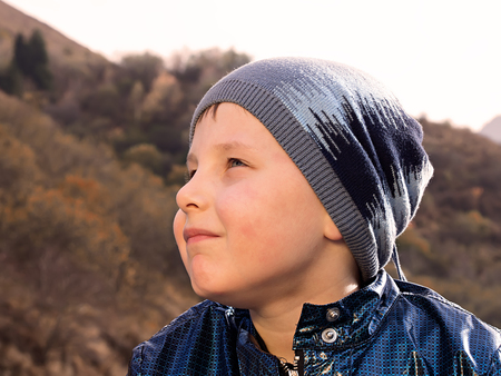 Portrait of caucasian boy in autumnの写真素材