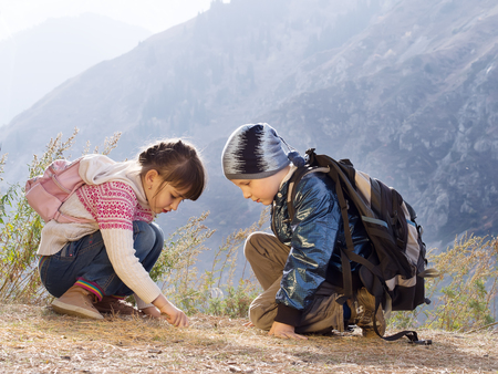 Portrait of hiking caucasian boy and girlの写真素材