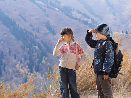 Portrait of hiking caucasian boy and girlの写真素材