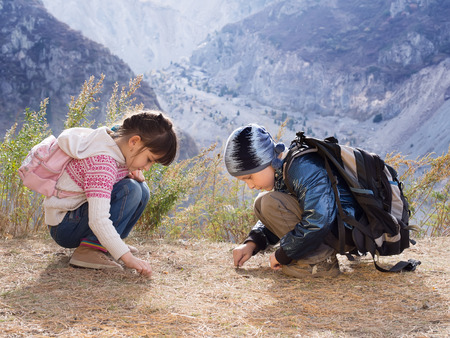 Portrait of hiking caucasian boy and girlの写真素材