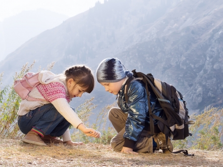 Portrait of hiking caucasian boy and girlの写真素材