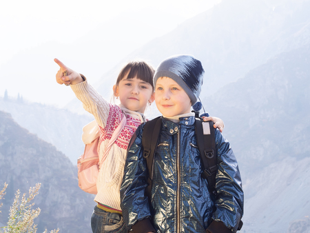 Funny hiking caucasian boy and girlの写真素材