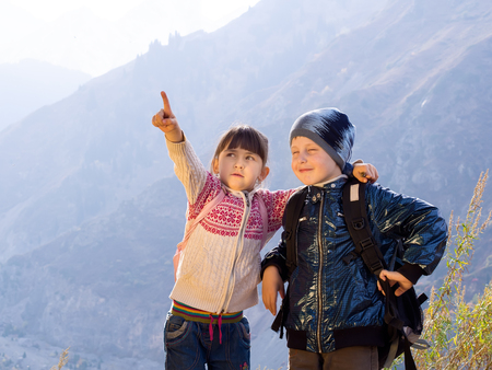Funny hiking caucasian boy and girlの写真素材