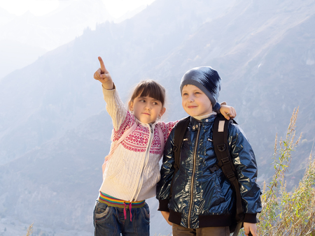 Funny hiking caucasian boy and girlの写真素材