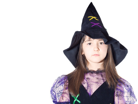 Portrait of caucasian girl in magician costume isolatedの写真素材