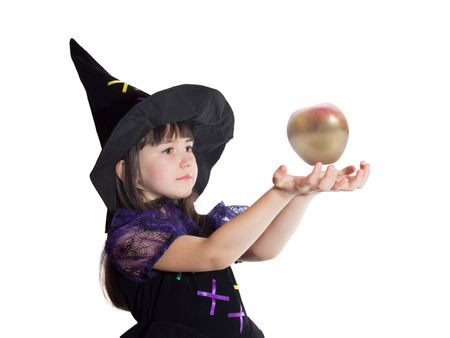 Portrait of caucasian girl in magician costume isolatedの写真素材