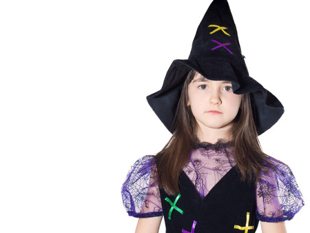 Portrait of caucasian girl in magician costume isolatedの写真素材