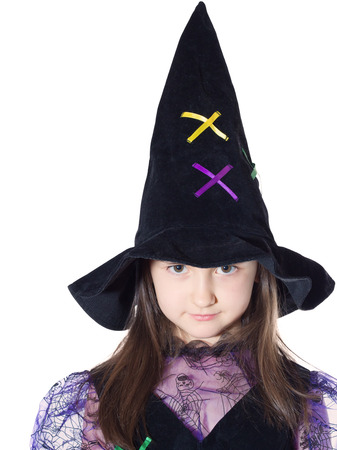 Portrait of caucasian girl in magician costume isolatedの写真素材