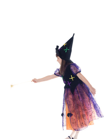 Portrait of caucasian girl in magician costume isolatedの写真素材