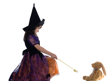 Portrait of caucasian girl in magician costume isolatedの写真素材