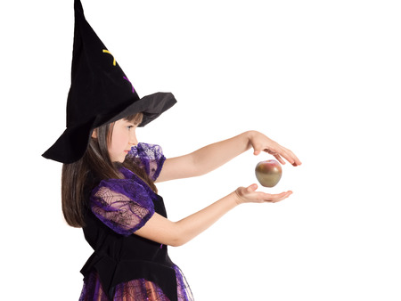 Portrait of caucasian girl in magician costume isolatedの写真素材