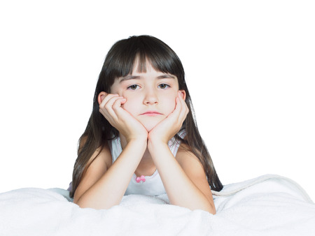 Portrait of caucasian  sad girl child kid isolated on white backgroundの写真素材