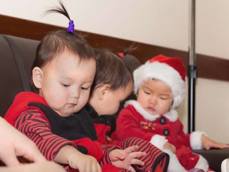 Group of asian children babies girls together at celebration Christmasの写真素材