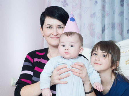 Caucasian family on happy birthday at home