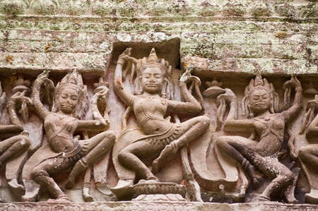 Detail of carving of Apsara Dancers in the Hall of Dancers at Preah Khan Temple, Angkor, Cambodia    Ancient carving, hundreds of years old の写真素材