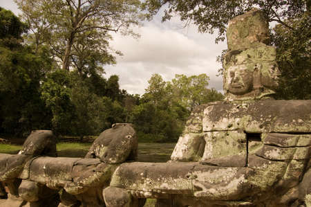 Statue of Vishnu pulling on the Naga serpent in the Churning of the Ocean of Milk legend   Causeway...