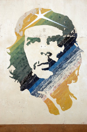 A wall painted with a colourful mural of the Cuban revolutionary leader Che Guevara   The image over...