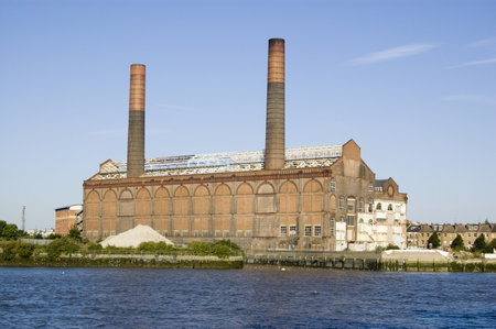 View across the River Thames towards the disused Lots Road Power Station in Chelsea.  It used to provide energy for the London Underground.のeditorial素材
