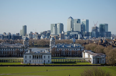 View from the hill at Greenwich Park looking over the Queen s House, Royal Naval College and River Thames towards the Isle of Dogs and Docklands development in London のeditorial素材