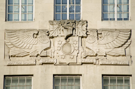 Stone sculpture of a motto on the exterior of BBC Broadcasting House in central London   Nation Shall Speak Peace Unto Nation   On public display since 1936   のeditorial素材
