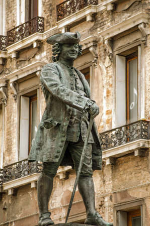 Bronze statue of the famous playwright Carlo Goldoni   1707 - 1793  sculpted by Antonio Dal Zotto  1841-1918  on display in Campo San Bortolomìo, Venice の写真素材
