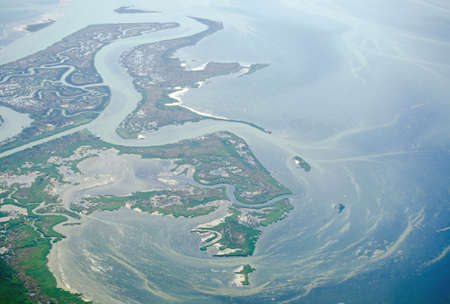 View from the air of the marshy islands to the North East of the Venice Lagoon, Italy の写真素材