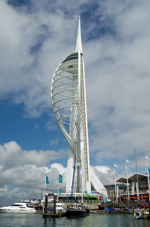 PORTSMOUTH, ENGLAND - 2 AUGUST  View from the sea of the landmark Spinnaker Tower at Gunwharf Quays, Portsmouth on August 2 2013   The area of shops and restaurants has been a successful redevelopment of former Royal Navy buildings のeditorial素材