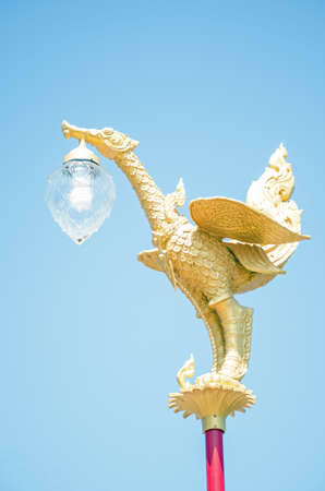 Ornate street lamp in the form of a dragon or bird   Hua Hin railway station, Thailand の写真素材