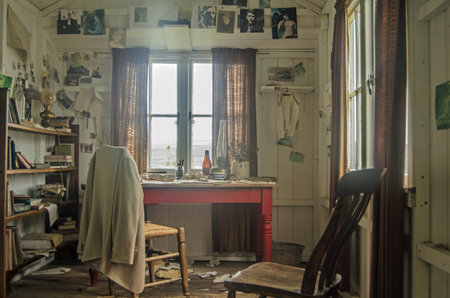LAUGHARNE, UK - May 5, 2014   View through a window of the wooden shed occupied by the great Welsh writer Dylan Thomas while writing his plays and poems overlooking the River Taf estuary in Laugharne, Carmarthenshire のeditorial素材