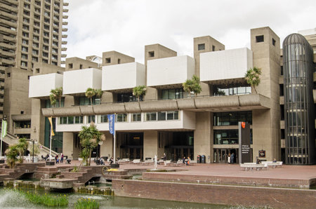 LONDON, ENGLAND - May 10, 2014  Lakeside view of the Barbican arts centre in the heart of the City of London   The venue includes a concert hall, theatres, cinemas and galleries のeditorial素材