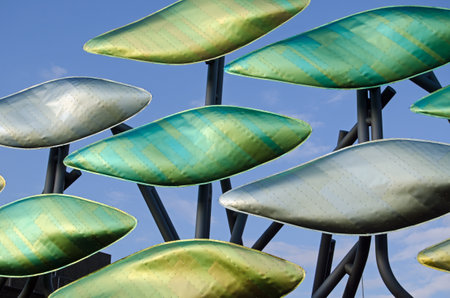 LONDON, ENGLAND - MAY 13, 2014   Detail of the large series of titanium metal shapes covering the bus station end of Stratford shopping centre in East London   Known as the Shoal のeditorial素材