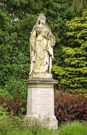 Statue of the late Queen Victoria on public display over 100 years in Abbey Gardens, Abingdon, Oxfordshire のeditorial素材