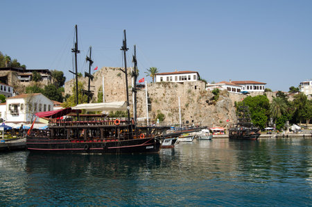 ANTALYA, TURKEY  AUGUST 18, 2014:  Pirate ships designed to take tourists on trips along the Mediterranean coast moored at the Old Harbour in Antalya, Turkey.のeditorial素材