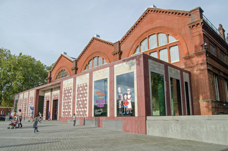 LONDON, UNITED KINGDOM - AUGUST 28, 2014: Families visiting the Museum of Childhood in Bethnal Green, London.  The museum, dedicated to toys and other objects, is part of the Victoria and Albert Museum.のeditorial素材