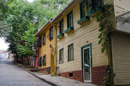 ISTANBUL, TURKEY - JUNE 5, 2016: Wooden homes on a steep road in Edirnekapi, a suburb in the west of Istanbul, Turkey.のeditorial素材