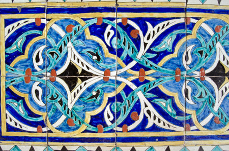 Handpainted, colourful tiles decorating the exterior of an old city mosque dating from the Ottoman era in the middle of Istanbul, Turkey.のeditorial素材